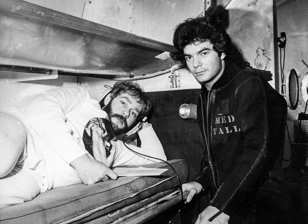 Two American deep-sea divers in a diving chamber in Norway in the 1970s.