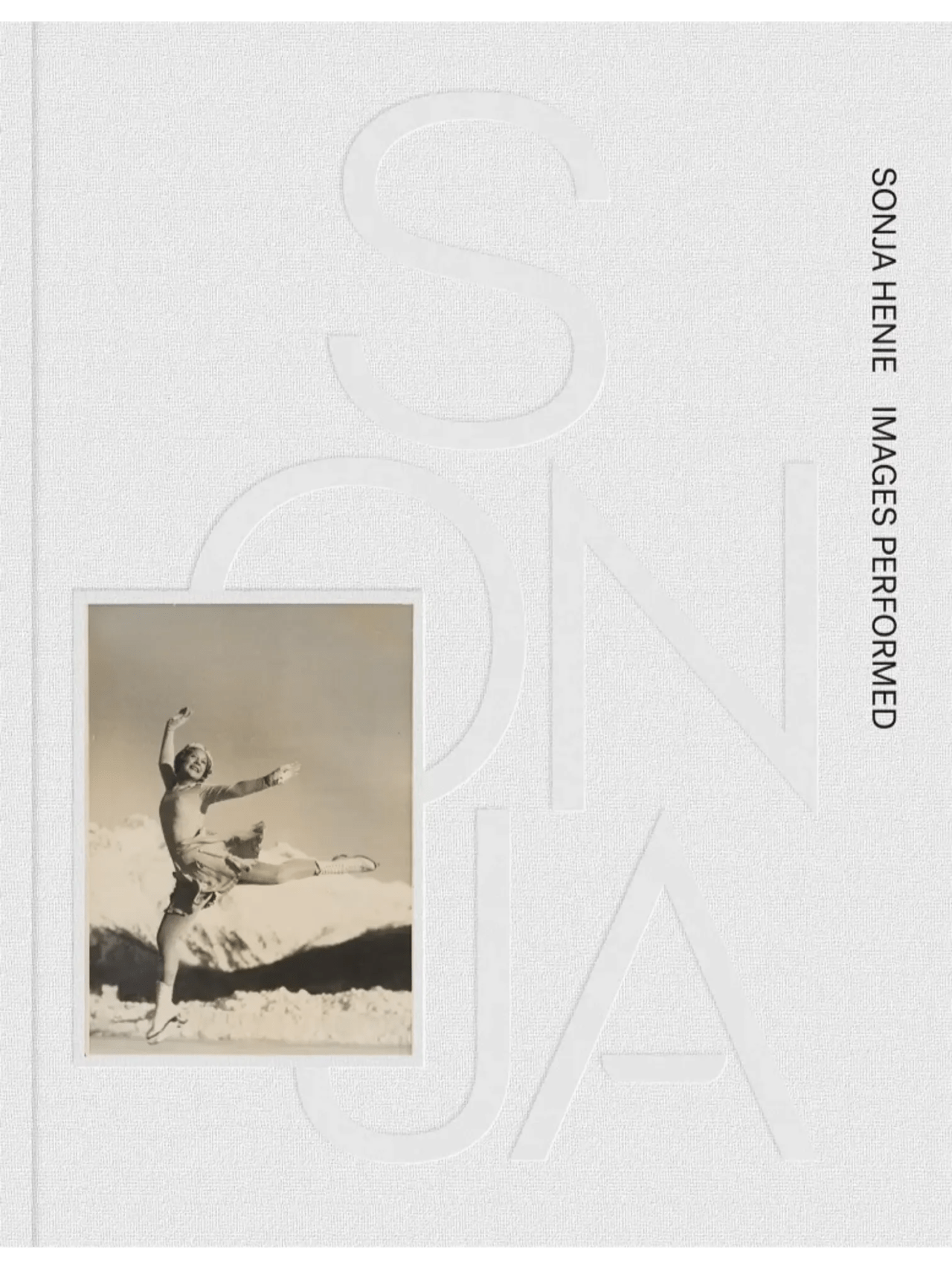 Book cover with a woman ice skater leaping through the air